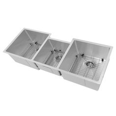 the double sink is white and has two faucets on each side, with one drain