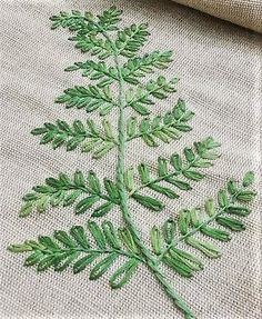 an embroidered plant is shown on the screen