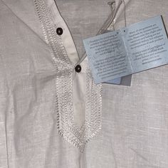 Authentic Indian Branded Shirt. Extremely Light Weight, And Cool To Wear For Summer. Traditional Hand Embroidery Traditional White Linen Shirt, White Summer Shirt With Chikankari Embroidery, Festive White Cotton Tops, Traditional White Shirt With Chikankari Embroidery, Casual Embroidered Short Sleeve Kurta, White Casual Top For Festive Season, White Casual Tops For Festive Occasions, Festive White Cotton Shirt, White Casual Festive Top