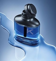 a bottle of blue liquid with a black cap on it's top is shown