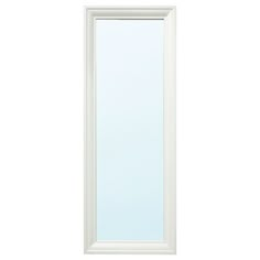 a white door with a glass window on the top and bottom half, in front of a