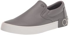 PRICES MAY VARY. Calvin Klein is a minimalist canvas for creative exploration. Founded in New York in 1968, the brand elevates everyday essentials to globally iconic status. Calvin Klein’s footwear offering is simple and pure, with clean lines born from a singular point of view Effortless and easy-to-style, these sneakers will become your new iconic essentials Imported Slip-On Silhouette Calvin Klein Logo Details Trainers Fashion, Calvin Klein Men, Athletic Fashion, Luxury Store, Mens Fashion Shoes, Grey Leather, Summer Shoes, Leather Sneakers, Slip On Sneaker