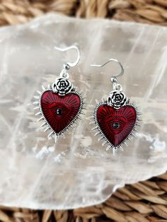 Red sacred Heart Eye Earrings Silver plated Silver Gothic Earrings For Valentine's Day, Gothic Heart-shaped Pierced Jewelry, Red Heart Charm Metal Earrings, Gothic Metal Earrings For Valentine's Day, Heart Shaped Metal Earrings For Valentine's Day, Heart-shaped Metal Earrings For Valentine's Day, Gothic Dangle Heart Earrings For Gift, Gothic Dangle Earrings For Valentine's Day, Red Nickel-free Dangle Heart Earrings