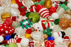 there are many different colored glass ornaments