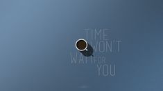 a coffee cup with the words time won't wait for you