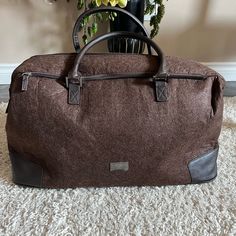 Hugo Boss Parfums ,Brown Felted Travel, Duffle Bag, Never Used , Super Clean , Good Condition , Perfect For 2-3 Day Trip. Brown Tote Travel Bag With Dust Bag, Casual Brown Travel Bag With Top Carry Handle, Casual Brown Duffle Bag With Zipper Closure, Casual Brown Rectangular Travel Bag, Casual Brown Travel Bag With Leather Trim, Casual Brown Duffle Bag With Luggage Sleeve, Casual Brown Rectangular Duffle Bag, Brown Travel Duffle Bag, Brown Casual Duffle Bag For On-the-go