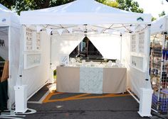 a white tent set up for an outdoor event