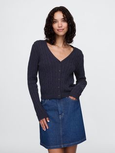 Soft cotton cardigan.  V-neck.  Long sleeves.  Button front.  Allover cable-knit.  Ribbed hem.  Fit: Classic.  A straight & easy fit.  Hits at the hip.  Models wearing Gap