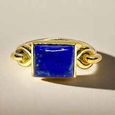 This gorgeous ring is both stately and whimsical, and is based on a Roman example dating to the second century AD. The delicately rounded shank gently holds a rectangular cabochon stone in a tall bezel setting. "Salus" means "health." Timeless Cabochon Sapphire Ring, Timeless Cabochon Rings For Formal Occasions, Formal Fine Jewelry Signet Ring With Cabochon, Formal Cabochon Signet Ring, Elegant Adjustable Stackable Signet Ring, Timeless Cabochon Sapphire Ring Gift, Timeless Gift Sapphire Cabochon Ring, Formal Square Rings With Polished Finish, Classic Signet Ring With Rectangular Gemstone