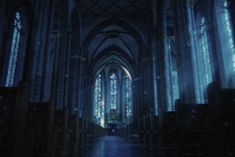 the inside of a church with stained glass windows