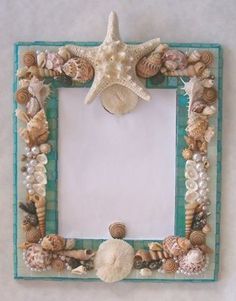 an ocean themed frame with seashells and starfish on the bottom is shown