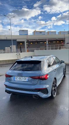 an audi car parked in a parking lot