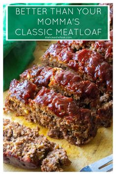 meatloaf on a cutting board with the words, better than your momma's classic meatloaf