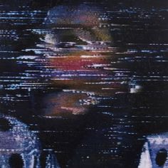 a blurry image of a man's face in front of an abstract background