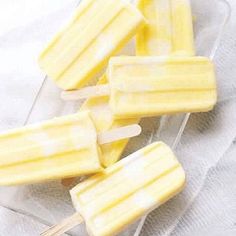 several popsicles sitting on top of a plastic container