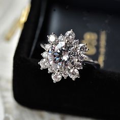 Moissanite diamond blossom halo engagement ring, VVS 3 carat round brilliant moissanite stone, engagement ring set in white gold plated 925 sterling silver with floral cluster micropavé on frame. Delicately crafted glamorous bridal wedding promise ring, super sparkly and stunning. Comes with luxurious velvet ring box. 💎 Features: ♥ Material: 925 sterling silver ♥ Main stone: Moissanite Gemstone ♥ Color: VVS ♥ Carat: 10mm, 3 carat approximately 💎 Details: ♥ Approximate Measurements: - Mainstone Diameter: 10mm - Whole Diameter: 13mm 🎁 Packing & Shipping: ♥ All our jewelry will be shipped with beautiful gift wrap packaging ♥ Handwrite gift notes/cards available upon request ♥ SAME DAY& FREE US Domestic Shipping available ♥ International customers: We ship worldwide! But we are not responsi Snowflake Ring, Ring Cluster, Floral Halo, Snowflake Shape, Bling Wedding, Round Diamond Ring, Writing Gifts, Trendy Ring, Ring Ideas