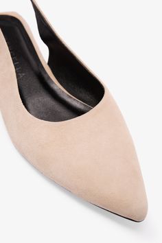 FINAL SALE - NO RETURNS, EXCHANGES, OR STORE CREDITA sleek shoe that's perfect for every day, our Jeanne Flats are feminine, yet frills-free. Combining a modern square heel silhouette with a pointed toe, these streamlined slingbacks are crafted in Italian suede leather with a low block heel and buckle fastening. Naturally, our Jeanne Flats are perfect to pair with skirts and dresses, but they also partner flawlessly with wide-leg pants and fitted trousers. Also available in two shades of distres Chic Block Heel Kitten Heels With Leather Sole, Chic Kitten Heels With Block Heel And Leather Sole, Chic Kitten Heels With Leather Sole, Spring Low Heel Suede Lined Heels, Chic Suede Kitten Heels For Office, Chic Suede Court Shoes With Heel Strap, Elegant Heels With Suede Lining, Suede Kitten Heels With Heel Strap, Chic Suede Court Shoes With Flat Heel