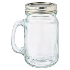 a glass mason jar with a metal lid