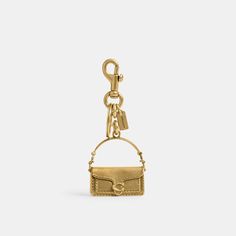 Calling all bag lovers. This polished charm captures our customer-favorite Tabby bag in rich detail. Attach it to a favorite bag or set of keys. | Coach Tabby Bag Charm - Women's - Brass/brass Elegant Everyday Bag Charm With Logo, Luxury Bag Charm With Keychain, Elegant Bag Charm With Logo, Elegant Gold Bag With Logo Charm, Luxury Bags With Logo Charm For Gift, Elegant Rectangular Bag With Keychain, Luxury Gold Bags With Brass Hardware, Elegant Rectangular Bag Charm, Gold Logo Charm Bag Charm