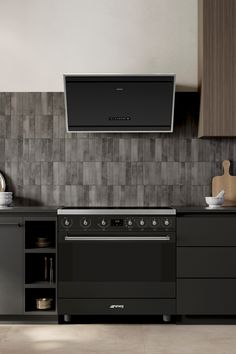 a stove top oven sitting inside of a kitchen next to a wall mounted microwave above it