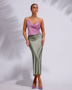 "Classic and trendy silk midi high-waisted skirt. It's elegant and sophisticated, there's nothing to add or remove, simple but at the same time unique. DETAILS - hits at mid-calf - high-waisted - solid color - elastic waistband - bias cut - relaxed fit silk top can be bought from us in the section \"tops\" Material  Silk and polyester blend SIZES Available in 2 sizes: XS-S, M-L XS-S = 2/4 US numeric  WAIST 23-26 inches or 59-67 cm HIPS 33-37 inches or 86-94 cm   M-L = 6/8 US numeric  WAIST 26-29.5 inches or 68-75 cm HIPS 37-41 inches or 94-104cm PAYMENT You can pay for your order with Paypal or using a credit card. Drop me a line, I'll send you an instruction from Etsy how to do it. SHIPPING Standard shipping is free to some countries. If you want to have express shipping, please upgrade w Elegant Satin Pencil Skirt For Night Out, Chic Silk Draped Midi Skirt, Feminine Satin Skirt For Night Out, Chic Silk Pencil Skirt For Night Out, Chic High-waist Satin Skirt, Elegant Midi-length Lined Draped Skirt, Elegant Draped Midi Skirt With Lining, Chic High Waist Satin Skirt, Elegant Midi Length Draped Skirt With Lining