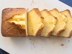 a loaf of pound cake sitting on top of a cutting board