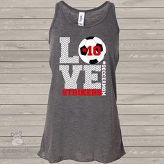 a women's tank top with the words love and soccer ball in red on it