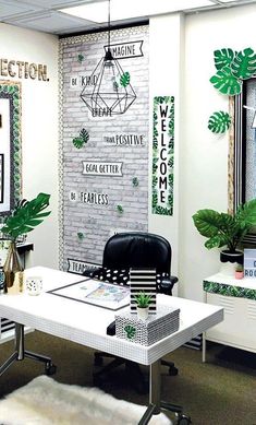 an office decorated in green and white for st patrick's day with posters on the wall