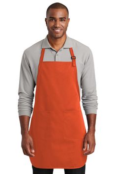 a man wearing an orange bib apron