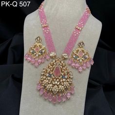 Glossy Pink hydro beads long Kundan necklace set/uncut Kundan long necklace set | Ethnic long necklace with Kundan stones and beads Elevate your elegance with our stunning Pachi Kundan Emerald Ruby Necklace, meticulously crafted to exude opulence and grace. This exquisite statement piece features intricate detailing with shimmering emeralds and rubies, set in the traditional pachi kundan style. Handcrafted by skilled artisans, this necklace reflects timeless Indian craftsmanship and heritage. Perfect for weddings, parties, or any special occasion, this necklace adds a touch of luxury to any ensemble. Surprise her with this exquisite piece as a thoughtful anniversary gift or celebrate your own style with this unique necklace. Make a statement and embrace the beauty of tradition with our Pac Luxury Pink Kundan Necklace For Festive Occasions, Elegant Luxury Pink Kundan Necklace, Luxury Pink Kundan Necklace, Fusion Style Kundan Beaded Necklaces, Long Kundan Necklace, Kundan Long Necklace, Non Uniform, Long Necklace Set, Kundan Necklace Set