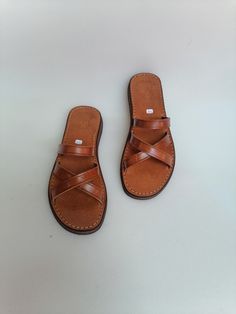 A beautiful 100% handcrafted women's sandal made with real leather and high quality organic material, perfect for sunny days, it is very comfortable and elegant. Soft and light, it is entirely handmade All manufacturing stages are carried out by hand All sizes are available ALL ORDERS ARE NOW SHIPPED VIA ARAMEX EXPRESS WORLDWIDE (please include a phone number at checkout, as it is required by the carrier). If you are unsure of your size, please contact me so I can help you. Wholesale Opportuniti Summer Huarache Sandals With Leather Sole For Vacation, Summer Vacation Huarache Sandals With Leather Sole, Summer Beach Flip Flops With Leather Lining, Summer Leather Lined Flip Flops For The Beach, Leather Lined Flip Flops For Summer Beach, Summer Vacation Huarache Sandals With Leather Footbed, Comfortable Summer Sandals With Leather Sole, Leather Summer Flip Flops With Open Toe, Summer Vacation Flip Flops With Leather Lining