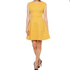 Closure Type: Zipper Note: Dress Looks More Yellow Than Gold On The Model. See Pictures Of Actual Dress To See Real Color. Neckline: Crew Neck Sleeve Length: Short Sleeve Sleeve Style: Cap Sleeve Apparel Length: 37.5 Inches Dress Length: Knee Length Fabric Content: 97% Polyester, 3% Spandex Fabric Description: Knit Yellow A-line Mini Dress For Work, Yellow Shift Dress, Mini Length, Jcpenney Dresses, Dress Looks, Size 12 Dress, The Boss, Boss Babe, Fit And Flare Dress, Liz Claiborne