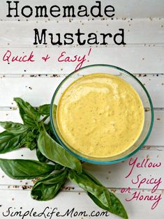 homemade mustard sauce in a glass bowl with basil sprigs on the side and text overlay