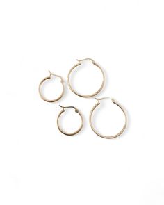 details: minimal hoops in solid 18k yellow gold finish choice of 15mm or 20mm diameter in size band width approx. 1.5mm latch back closure Style with Northern star pendent, solo freshwater pearl pendent or mini lock and key pendent Classic 14k Gold Open Circle Jewelry, Classic Small Hoop Jewelry For Everyday, Simple Small Hoop Everyday Jewelry, Timeless Hoop Jewelry For Everyday, Classic Single Earring For Everyday, Timeless Everyday Hoop Jewelry, Polished Everyday Rounded Jewelry, Everyday 14k Gold Open Circle Jewelry, Everyday Polished Rounded Jewelry