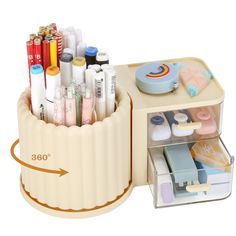 the container is filled with markers and pens