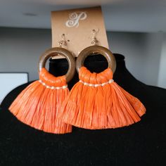 Cute Wood And Orange Rafia Earrings By Plunder. Perfect For A Tropical Statement Earings. Wore My Personal Pair On Vacation And Got Many Compliments Multiples Available For Subscription Box Or Bridesmaids Gifts Summer Orange Tassel Earrings Gift, Orange Bohemian Earrings For The Beach, Bohemian Orange Earrings For The Beach, Bohemian Orange Earrings For Beach, Orange Summer Earrings For Vacation, Handmade Orange Tassel Earrings For Summer, Orange Earrings For Summer Beach Occasion, Orange Earrings For Summer Beach Outings, Orange Earrings For Summer Gifting