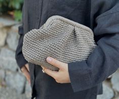 Discover timeless elegance with our Mink Clutch Bag. Handcrafted to perfection, this exquisite woven straw natural handbag is the epitome of artisan craftsmanship. Made from knitted raffia, it exudes an eco-friendly charm while providing a stylish solution for your essentials. The rich, mink hue of this clutch bag adds a touch of sophistication to any outfit, making it the perfect accessory for both casual outings and special occasions. Its versatile design allows it to complement a wide range of styles and ensembles. With a spacious interior, this clutch bag provides ample room for your essentials, whether you're heading out for a brunch date or an evening soirée. The natural raffia material not only offers durability but also a lightweight feel, ensuring comfort throughout your day or ni Elegant Beige Woven Bag, Elegant Handmade Natural Clutch, Elegant Beige Straw Bag For Everyday Use, Elegant Beige Straw Bag For Everyday, Elegant Beige Woven Clutch, Elegant Handwoven Beige Clutch, Elegant Beige Handwoven Clutch, Elegant Handwoven Straw Bag For Everyday, Chic Everyday Clutch In Natural Color