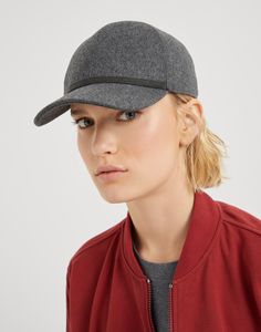 Virgin wool and cashmere flannel baseball cap with shiny band Precious details and refined Brunello Cucinelli materials enrich the sporty attitude of this new baseball cap. Versatile and elegant, the accessory is made of soft virgin wool and cashmere flannel, highlighted by a tonal shiny monili band that introduces a feminine, sparkling note. Luxury Adjustable Six-panel Baseball Cap, Classic Wool Baseball Cap For Winter, Adjustable Wool Six-panel Baseball Cap, Wool Baseball Cap For Fall, Winter Sporty Curved Brim Baseball Cap, Classic Adjustable Wool Baseball Cap, Luxury Wool Felt Hat For Winter, Blazer And T Shirt, Tuxedo Pants