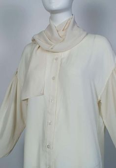 For Sale on 1stDibs - With a seven-foot neck sash and billowing drop sleeves, this romantic blouse offers endless styling possibilities. An ideal work-to-weekend piece, this 1970s Blouse, Poet Blouse, Givenchy Couture, Romantic Blouses, Butterfly Blouse, Silk Shorts, Lace Inset, Loose Blouse, Collar Blouse