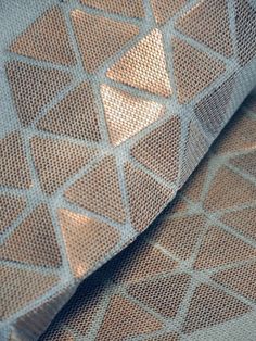 a close up view of a fabric with an interesting design on the outside and inside