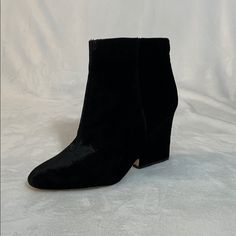 Sam Edelman Wilson Boot Black Velvet Boots Bootie Booties Size: 8, Eu 38 Condition: New In Box Fabrication: Black Velvet Seasonless, Timeless Booties With Unique Architectural Velvet Covered Wedge Heels Black Velvet With Inside Black Color Zipper For Ease Getting Booties Off And On Versatile Boot -- Can Easily Be Dressed Up Or Down Almond Shaped Toe Heel Height At Back Of Shoe -- 3.75" Boots Are New In Box From Sam Edelman Boutique Colors May Vary Slightly Due To Different Monitors. Bc Black Round Toe Booties For Formal Occasions, Winter Formal Ankle Booties, Formal Winter Ankle Booties, Black Heeled Boots With Round Toe And Heel Tab, Black Formal Winter Booties, Black Closed Toe Booties For Work, Black High Ankle Booties For Work, Winter Formal Booties With Stacked Heel, Winter Formal Black Booties