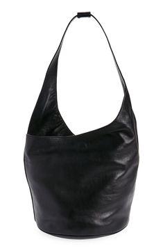 A sloped topline adds an asymmetric edge to this modern bucket bag that's made from leather in a slouchy silhouette that's structured enough not to topple over. Magnetic closure Shoulder strap Interior zip pocket Softly structured silhouette with flat base for stability Leather lining Leather Imported Modern Leather Hobo Bag In Bucket Shape, Black Leather Minimalist Bucket Bag, Black Textured Leather Bucket Bag, Elegant Leather-lined Bucket Shoulder Bag, Modern Leather Bucket-shaped Hobo Bag, Academic Drawing, Adjustable Bag, Black Sparkle, Leather Bucket