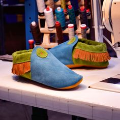 Custom Shoe of the Week: Youth Suede Moccasins in Medium Blue and Moss with Honey Fringe. Handcrafted in Oregon, USA. Green Moccasins With Leather Sole, Green Slip-on Moccasins With Rubber Sole, Green Leather Sole Closed Toe Moccasins, Green Closed Toe Moccasins With Leather Sole, Leather Non-slip Slip-on Moccasins, Leather Slip-on Non-slip Moccasins, Suede Moccasins With Soft Sole And Closed Toe, Suede Moccasins With Soft Closed Toe, Closed Toe Suede Moccasins With Soft Sole