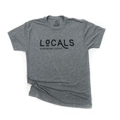 The Locals Supporting Locals t-shirt, is on our heather grey tri-blend that we all love! Grab this tee to help support your local business community! The Locals Supporting Locals campaign was started in March of 2020 as a way to give back to other Baton Rouge businesses and support our community in a time of need. To continue this initiative, Sweet Baton Rouge is partnering with the Boys & Girls Clubs of Metro Louisiana! Each month, 50% of the proceeds from the sale of items from the Locals Local T Shirt Design, Business Logo On Shirts, Company Merchandise Ideas, Company T Shirt Design, Small Business Shirt, Fall Apparel, Tshirt Business, Shirt Business, Uniform Shirts