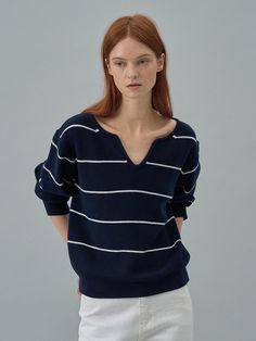 Our season-to-season, classic and cozy sweater. Designed to be worn layered or alone.We just want to reach out and touch this perpetually cozy-chic sweater. - Split neck striped knit top - Ribbed cuffs and hem - Slightly drop shoulders - Super soft, no wardrobe is complete without this forever-polished top- Soft and cozy, this top is the kind of layer we want to finish every outfit- You will be more stylish in this top Classic Fall Tops With Contrast Stripes, Chic Fall Sweater With Striped Collar, Classic Striped Sweater For Spring, Winter Sweater With Striped Collar, Striped Sweater For Winter Workwear, Winter Striped Sweater For Work, Striped Fine Knit Sweater For Spring, Chic Sweater With Contrast Stripes For Winter, Chic Winter Tops With Striped Collar