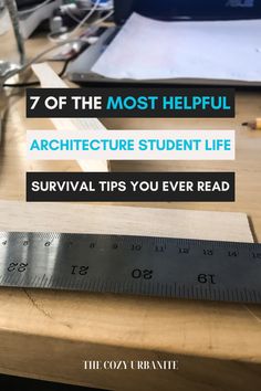 a ruler sitting on top of a wooden table next to a piece of paper with the words, 7 of the most helpful architecture student life survival tips