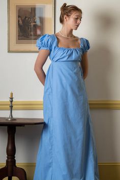 Light Blue Short Sleeve | Regency Gown - Samson Historical Cotton Victorian Dress With Fitted Bodice, Cotton Prairie Dress With Fitted Bodice, Victorian Cotton Prairie Dress, Cotton Regency Prairie Dress With Empire Waist, Spring Regency Style Maxi Dress With Empire Waist, Cotton Prairie Dress With Empire Waist In Regency Style, Cotton Maxi Dress With Square Neck For Daywear, Spring Regency Style Prairie Dress With Empire Waist, Cotton Victorian Dress With Fitted Bodice For Daywear