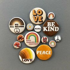 buttons with different sayings on them are arranged in a circle and placed next to each other