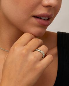 Add a fun twist to your look with our Wavy Stackable Ring. With a trendy 5mm width, it's the perfect mix of classy and quirky. The wavy shape makes it a breeze to stack with your favorite rings. Whether you're keeping it casual or dressing up, this ring's got a laid-back vibe with a touch of old-school cool that works for any mood or style.Materials: Plated in 14K yellow gold or white gold plated Measurements: Width of the ring: 5mm. Ring Sizes: 5, 6, 7, 8, 9 Hypoallergenic; nickel, lead, and ca Modern Adjustable Hypoallergenic Stackable Rings, Adjustable Bypass Ring With Modern Twist, Modern Twist Adjustable Bypass Ring, Modern Twist Metal Ring Jewelry For Everyday, Trendy Stackable Rings For Anniversary, Everyday Modern Twist Metal Ring, Trendy Stackable Midi Rings For Anniversary, Trendy Adjustable Stackable Rings For Anniversary, Modern Twist Midi Promise Ring