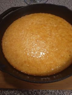 a cake in a pan sitting on top of a counter